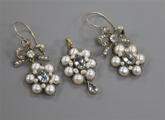 A 9ct gold, aquamarine and split pearl cluster pendant and a pair of matching earrings.